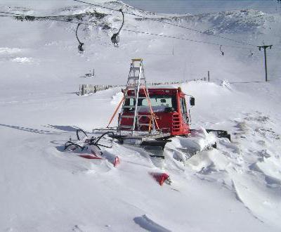 9-6-12 - The Edge groomer buried in snow at the base area
