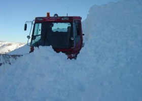 9-6-12 - The Groomer clearing avalanche debris off the road