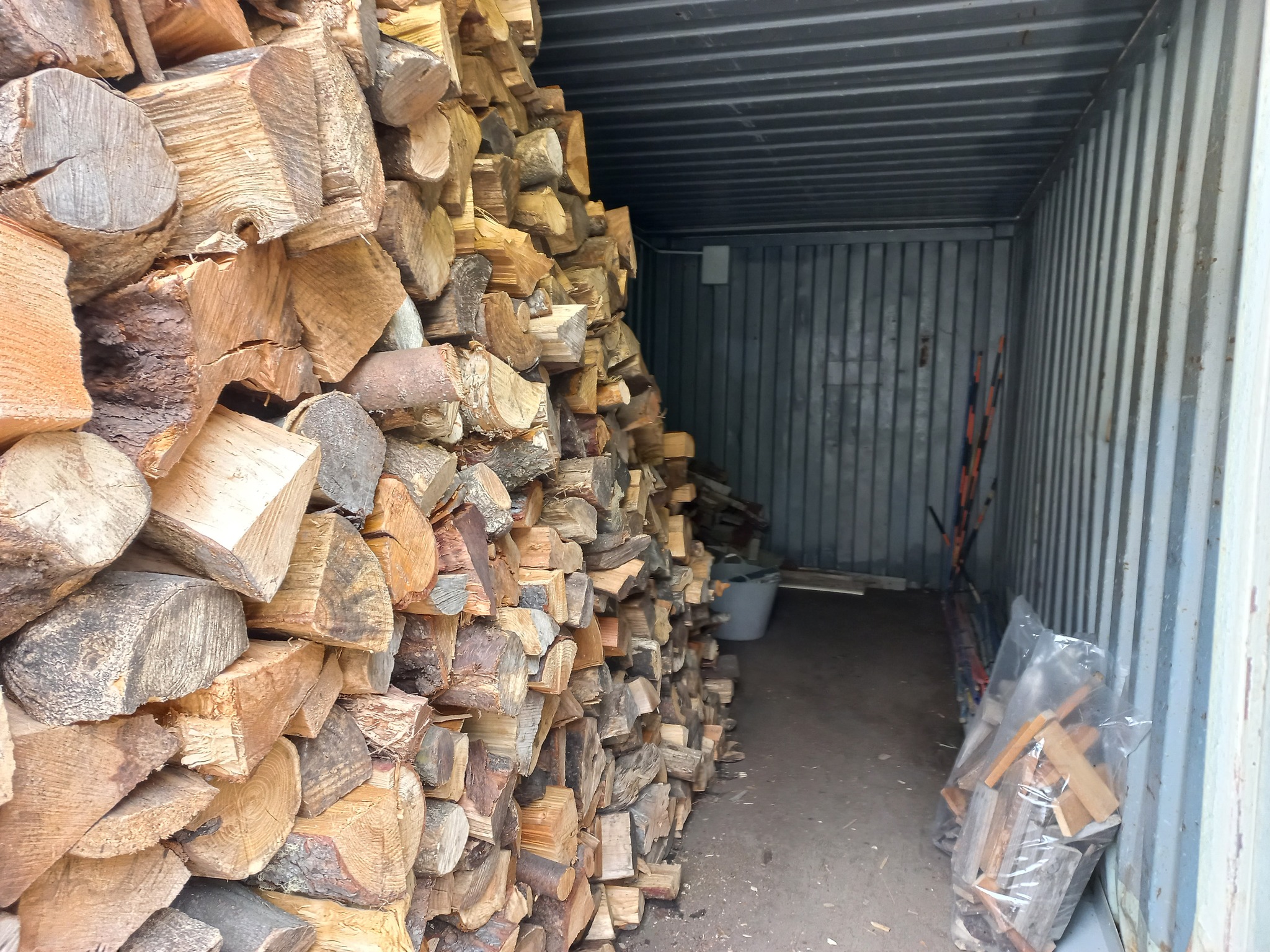 Racking-and-stacking-the-firewood-for-winter